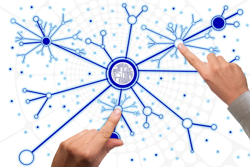 indoors, blue, abstract, studio shot, social network, presentation, www, logo, technology, real people, communication, circle, human body part, holding