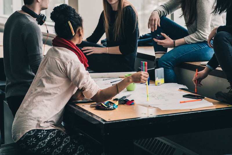 men, homework, group of people, group, sitting, women, table, education, learning, shirt, people, teamwork, man, creativity, concentration, activity, cooperation