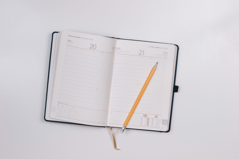 single object, open, people, white, education, learning, publication, directly above, copy space, studio shot, diary, paper, spiral notebook, table, pencil