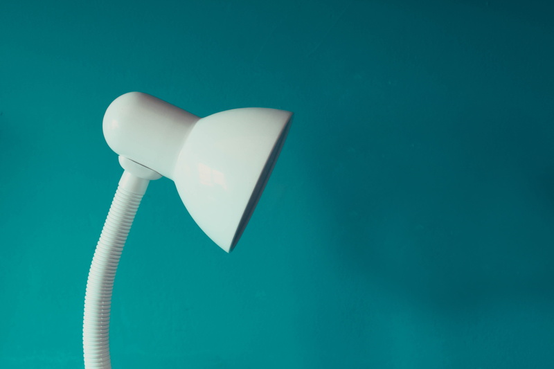 lamp, indoors, desk, task, studio shot, design, energy efficient, turquoise colored, light, power supply, wall - building feature, electricity, single object