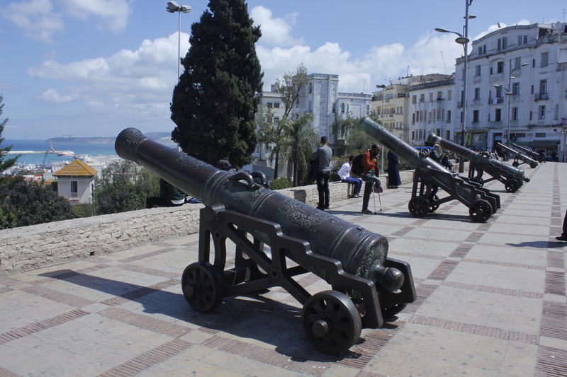 built structure, outdoors, nature, gun, army, skirmish, weapon, building exterior, architecture, town, city, old, incidental people, history, war, bomb