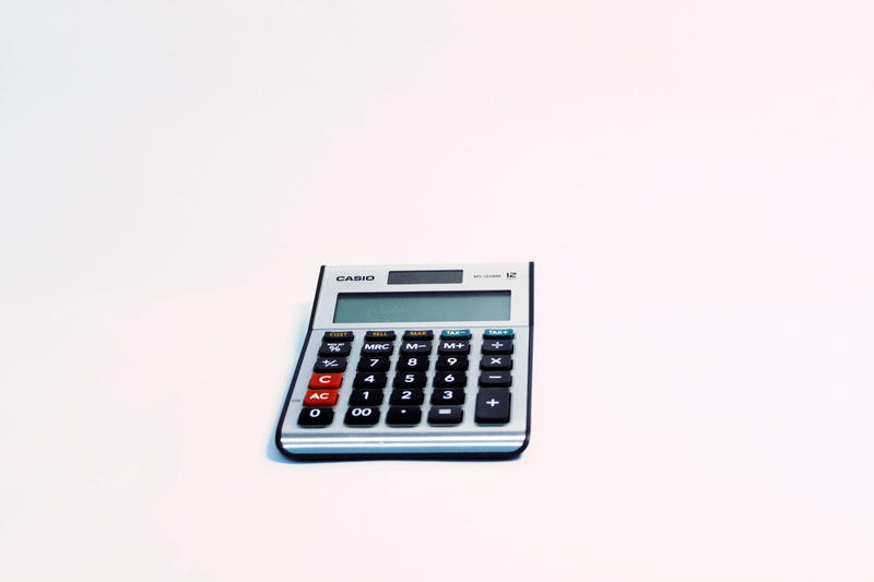 office, finance, copy space, accounting, accuracy, count, planning, calculator, no people, mathematics, keypad, single object, studio shot, calculating
