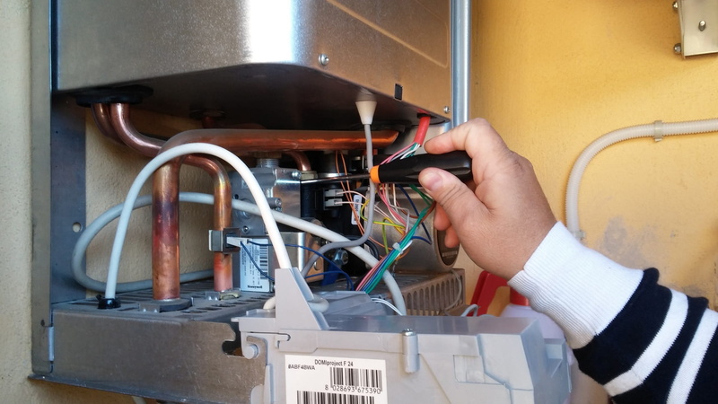 control, broken boiler, technology, close-up, hand, holding, human body part, industry, repairing, working, repair, cable, one person, electrical equipment