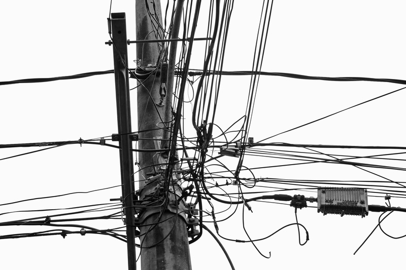 technology, lighting equipment, clear sky, outdoors, electricity pylon, wiring, no people, metal, sky, lines, low angle view, installation, industry, electrical wires