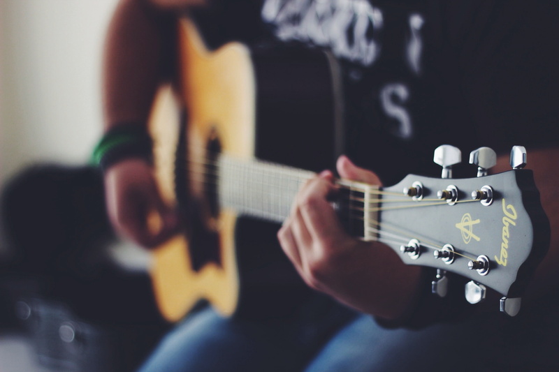 electric guitar, strings, plucking an instrument, hand, one person, hands, indoors, plays, arts culture and entertainment, guitar, music, acoustic, artist
