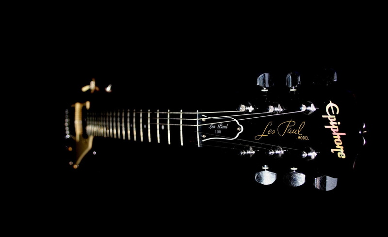 string instrument, black, still life, spanner, musical equipment, musical instrument, Guitar, metal, close-up, motion, Epihone, indoors, creativity, studio shot