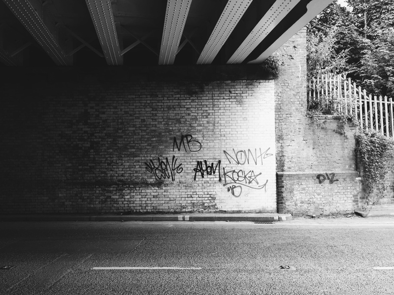 outdoors, architecture, art and craft, text, old, city, tags, wall - building feature, contrast, street, iphone6, uk, graffiti, western script, bridge
