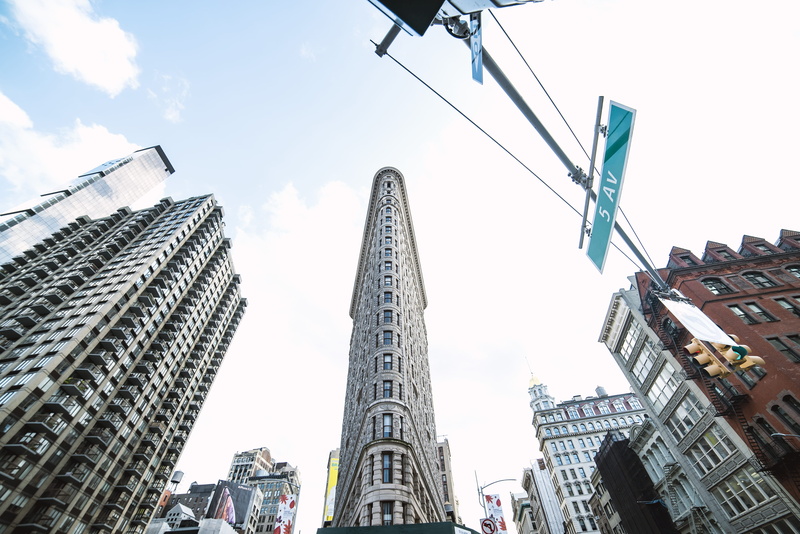 sky, housing, rise, white, financial district, street sign, outdoors, town, tower, ground, travel destinations, built structure, concrete, united states