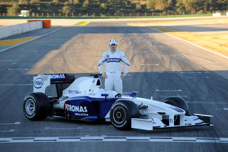 standing, competition, crash helmet, car, land vehicle, bmw, driving, sauber, racecar, sports race, road, uniform, sports track, f, sport, full length