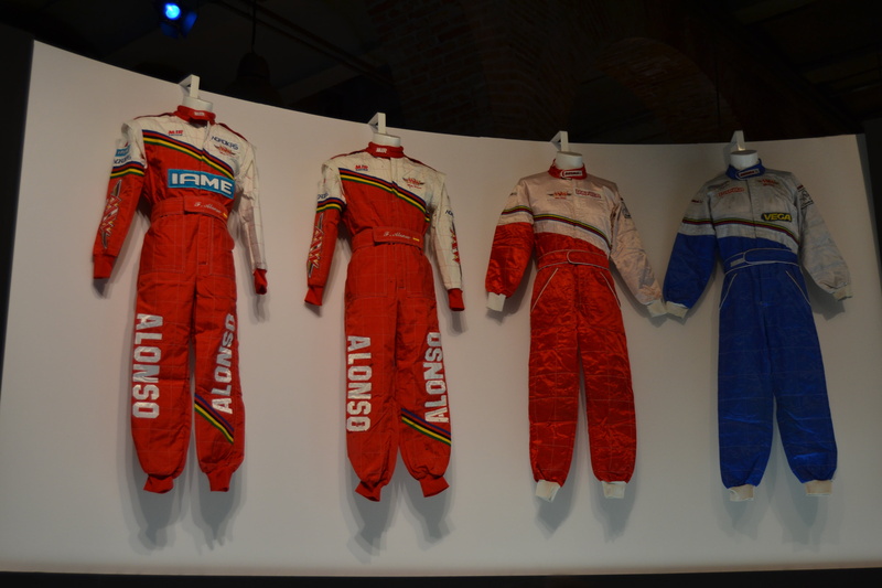 side by side, mono, traditional clothing, human representation, still life, multi colored, automobile, motor racing, career, choice, red, order, formula 1