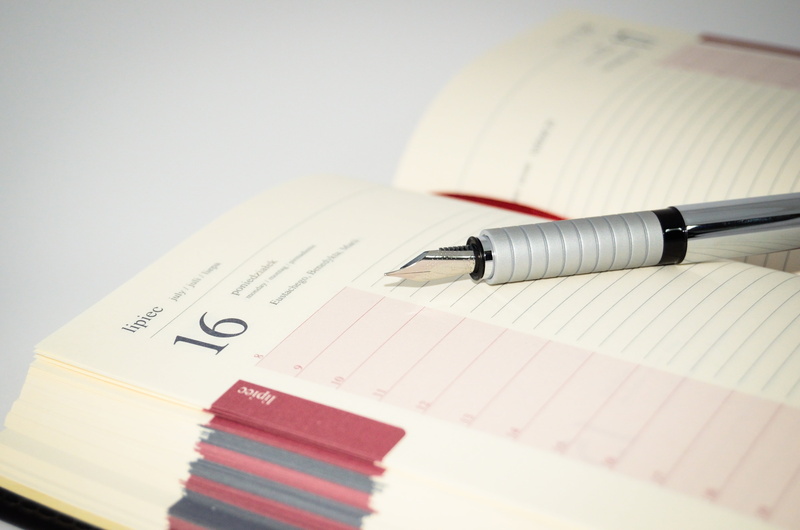 pen, document, indoors, notebook, time, book, writing instrument, communication, beige, pencil, paper, two objects, calendar, office, close-up, fountain