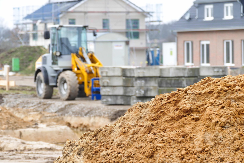 development, mode of transportation, earth construction, built structure, outdoors, construction equipment, architecture, construction, site, new building