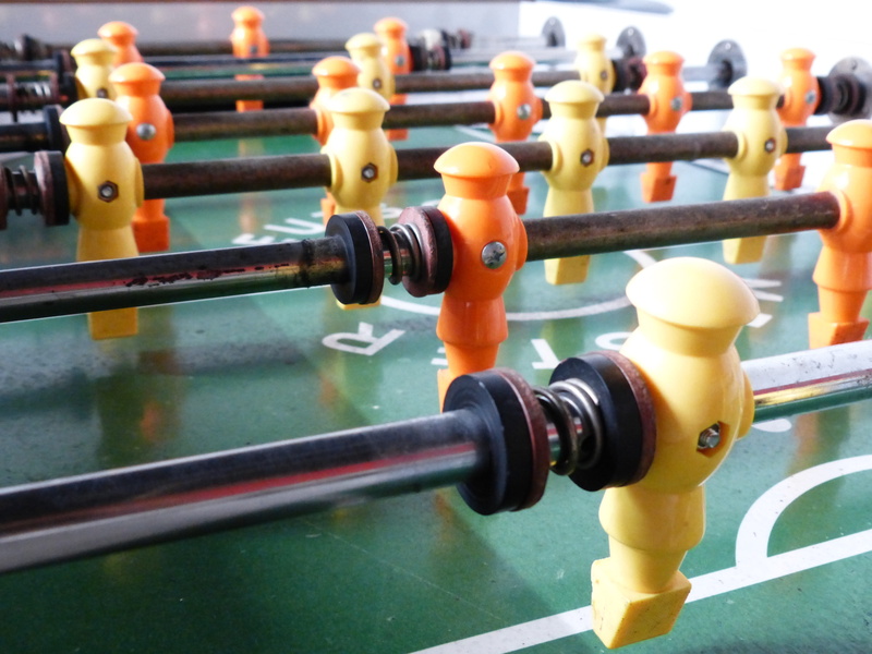 player characters, 4K, game table, yellow, relaxation, representation, handle bars, orange, football sports, metal, human representation, selective focus