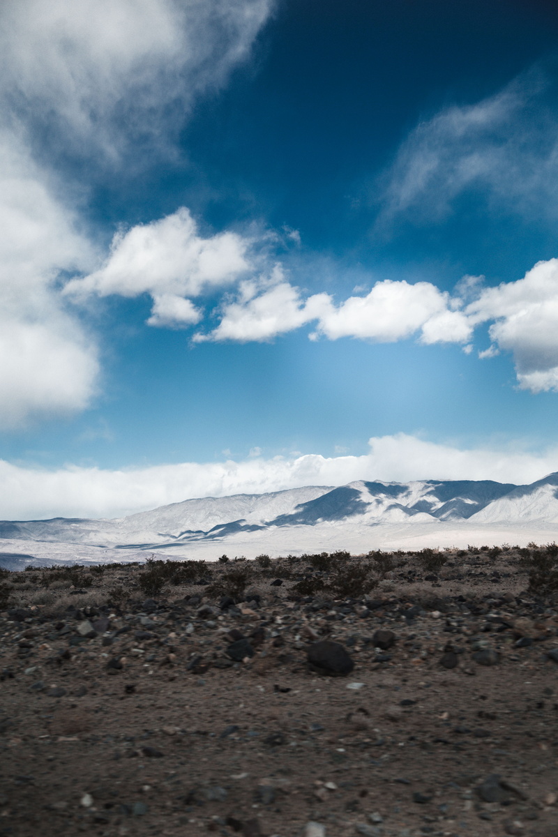 cloud - sky, non-urban scene, sea, tranquil scene, universe, sand, environment, outdoors, outside world, water, landscape, mountain, sky, explore, no people