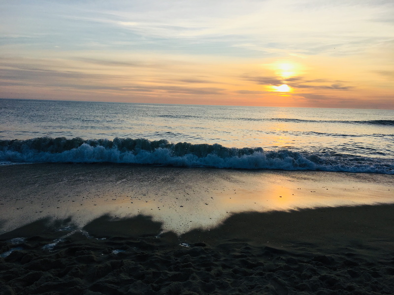 outdoors, dusk, ocean, sky, beauty in nature, sea waves, tranquil scene, shoreline, water, no people, horizon over water, idyllic, horizon, beach, orange color