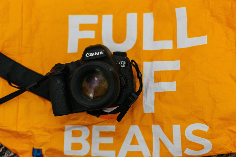 indoors, 5K, flyer, computer hardware, paper, studio shot, filming, black color, video camera, single object, text, strap, close-up, camera - photographic equipment