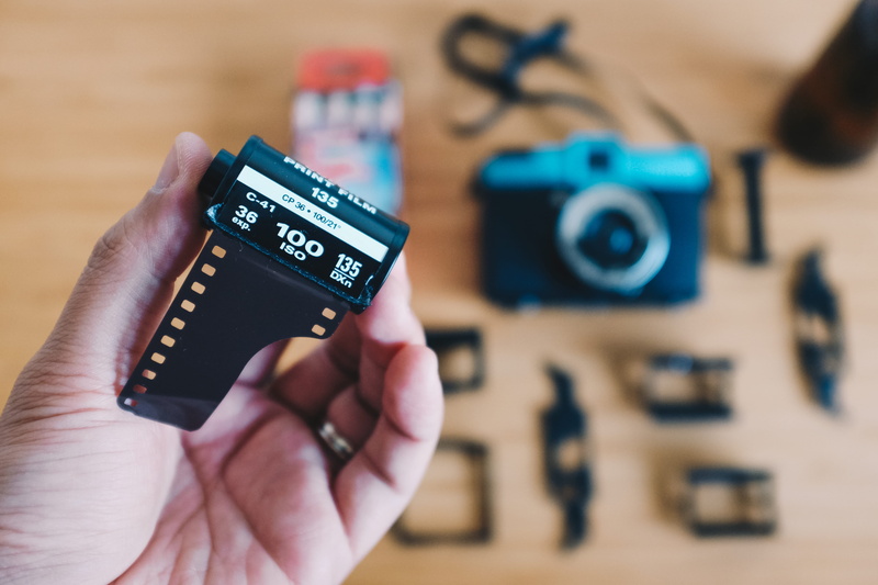 electronics, focus on foreground, lomography, camera - photographic equipment, laptop, number, vintage, close-up, holding, mobile phone, finger, black