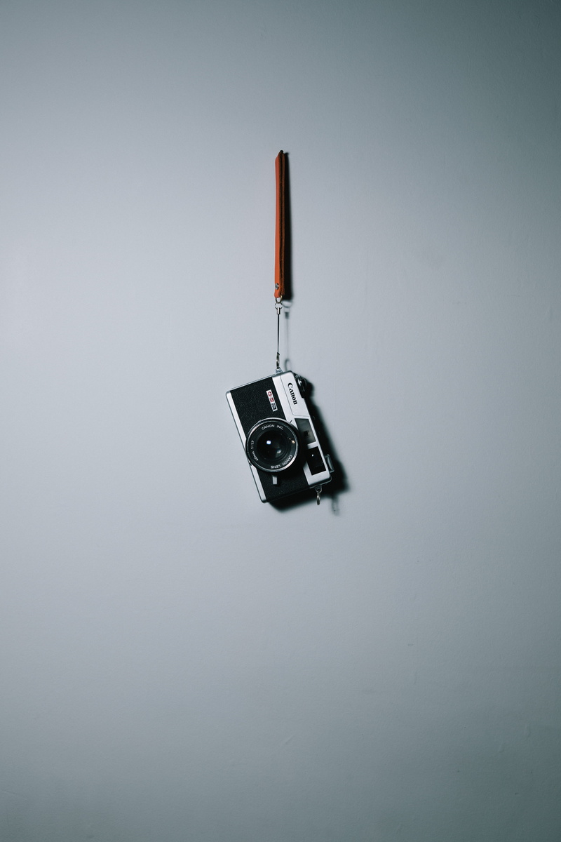 no people, gray, close-up, indoors, retro styled, vintage, two objects, 5K, photography, canon, black, technology, copy space, white background, analog camera