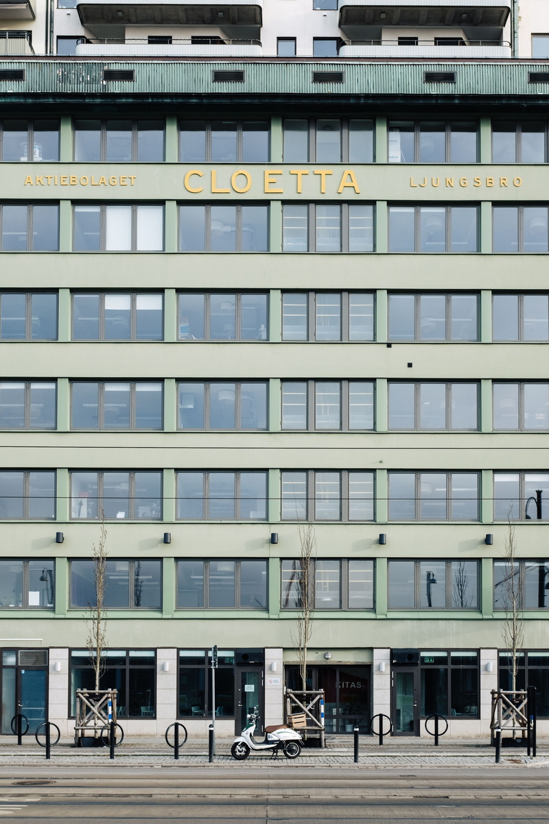 building exterior, daytime, straight, city, office building exterior, doorway, architecture, transportation, cloetta, moped, scandinavium, building, land vehicle