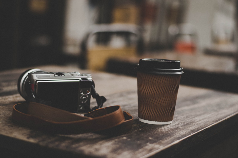 table, day, technology, shoot, cup, photography themes, still life, wood - material, lens - optical instrument, black, selective focus, indoors, equipment
