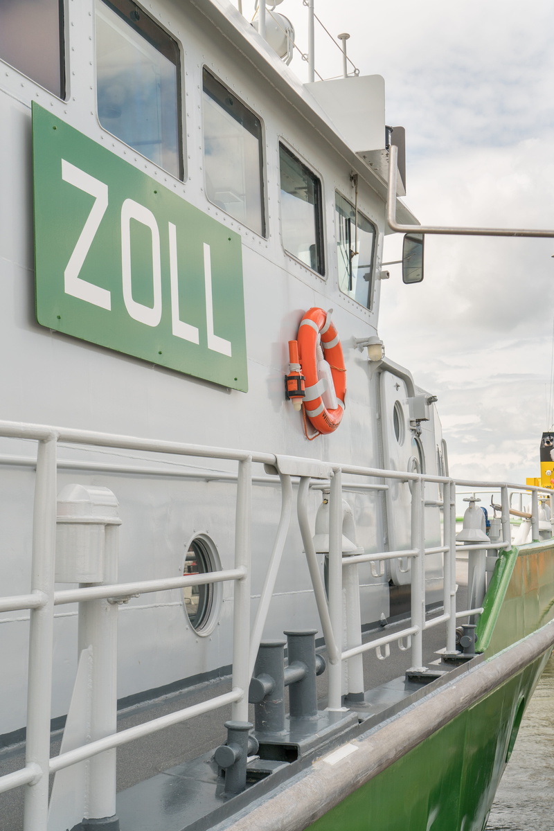travel, red, customs, safety, no people, control, building exterior, mode of transportation, built structure, outdoors, nautical vessel, search, text, low angle view