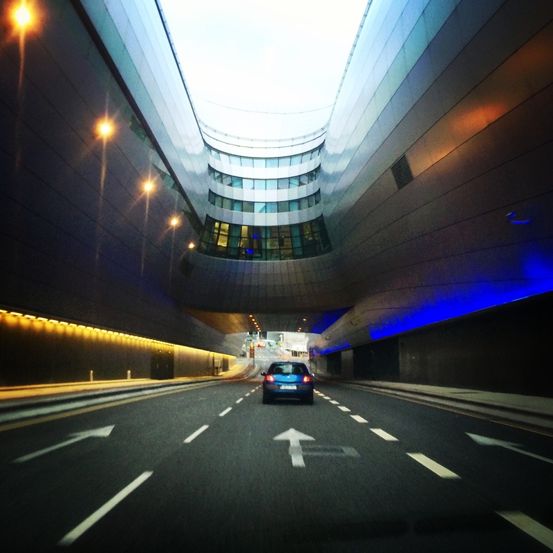 tourism, architecture, street, built structure, mode of transportation, europe, sign, arrival, car, travel, city, aviation, road, transportation, airport