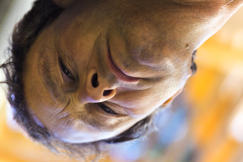 one person, one animal, whisker, 2K, body part, excelsior, man, eyes closed, looking down, close-up, animal body part, intense, human face, headshot, portrait