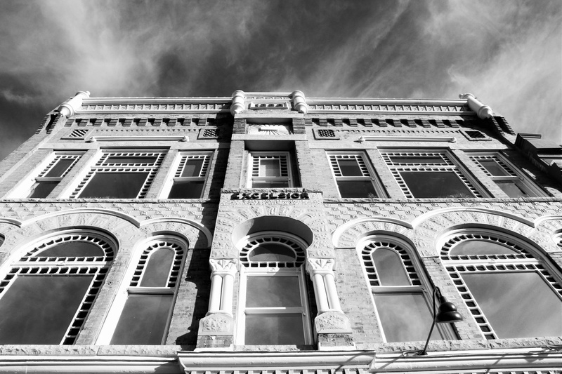 cloud - sky, the past, sunlight, facade, gothic style, building exterior, united states, architectural column, architecture, window, sky, low angle view
