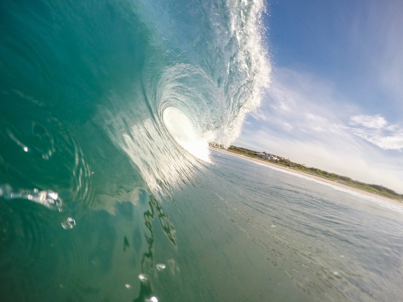 wave, breaking, surfer, motion, sky, water, beauty in nature, wind, coastline, view, surf, aquatic sport, waves, land, no people, barrel, outdoors, swell