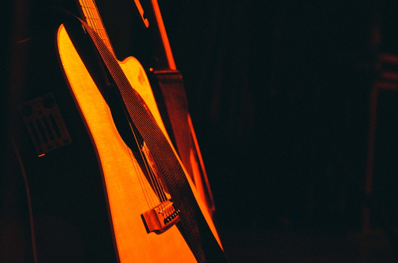 crystal, indoors, light - natural phenomenon, electric guitar, gitarre, stage, reese theater, orange color, lighting equipment, dark, lute, bass guitar