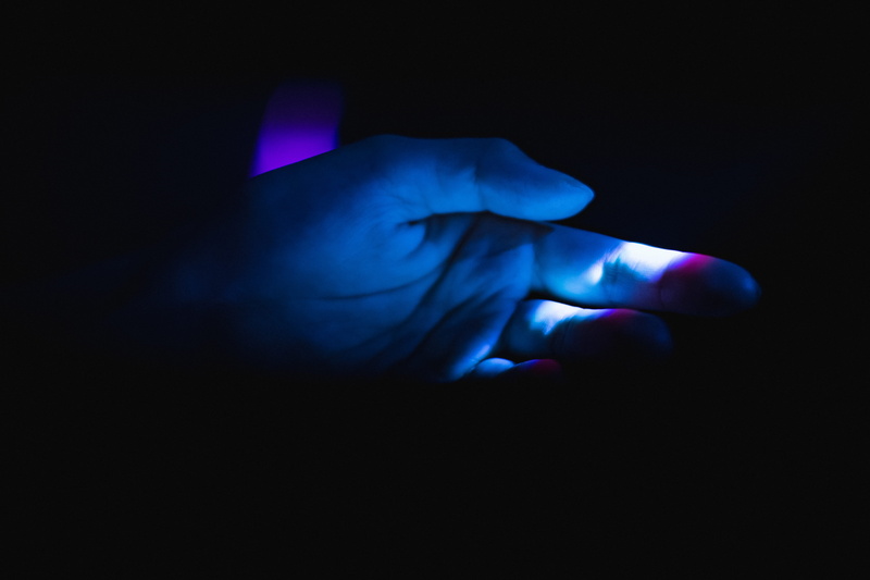 body part, wrist, human body part, lightning, dungeon, hand, indoors, night, money, person, finger, plectrum, illuminated, laser, crystal, nail, light