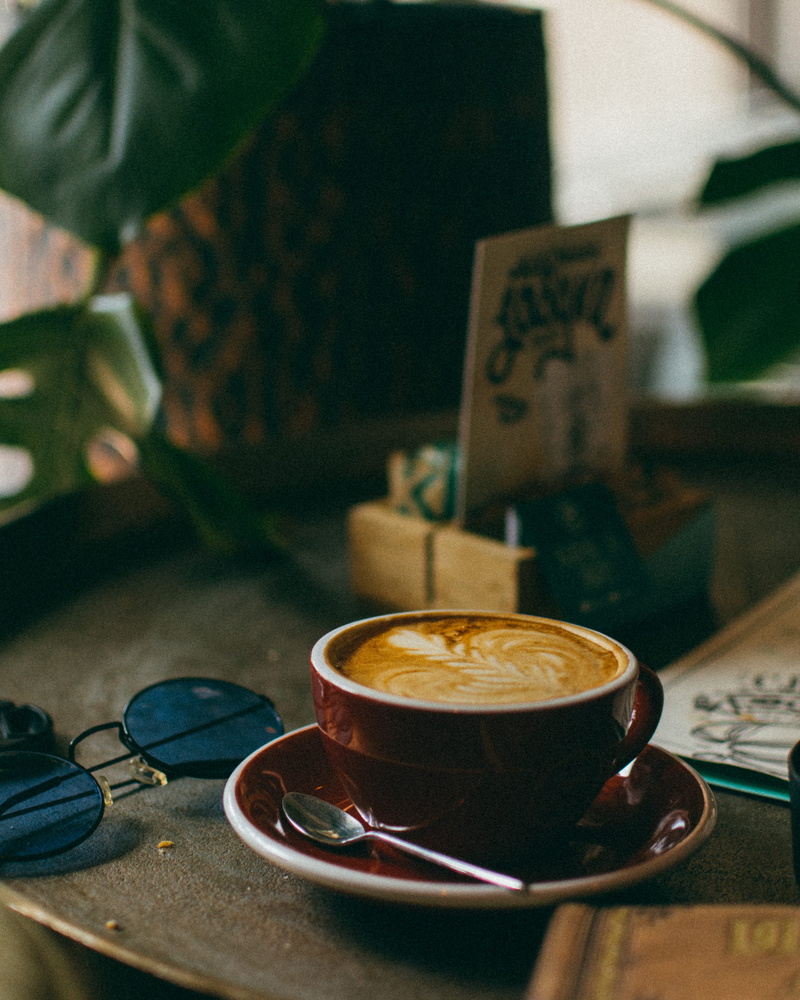 pottery, cutlery, freshness, crockery, coffee table, table, no people, latte, food and drink, cafeteria, coffee, saucer, still life, restaurant, beverage