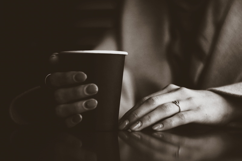 nail, body part, women, midsection, mug, woman, patio, hand, coffee, 5K, holding, beverage, close-up, drinking, indoors, refreshment, wood, cup, adult