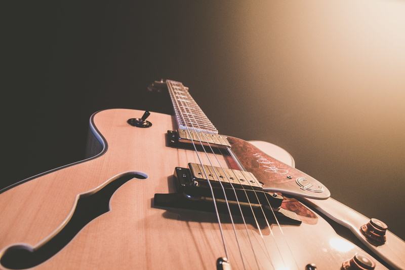 musical equipment, guitar, bass guitar, background, musical instrument string, musical instrument, brown, electric guitar, wood - material, string, black background