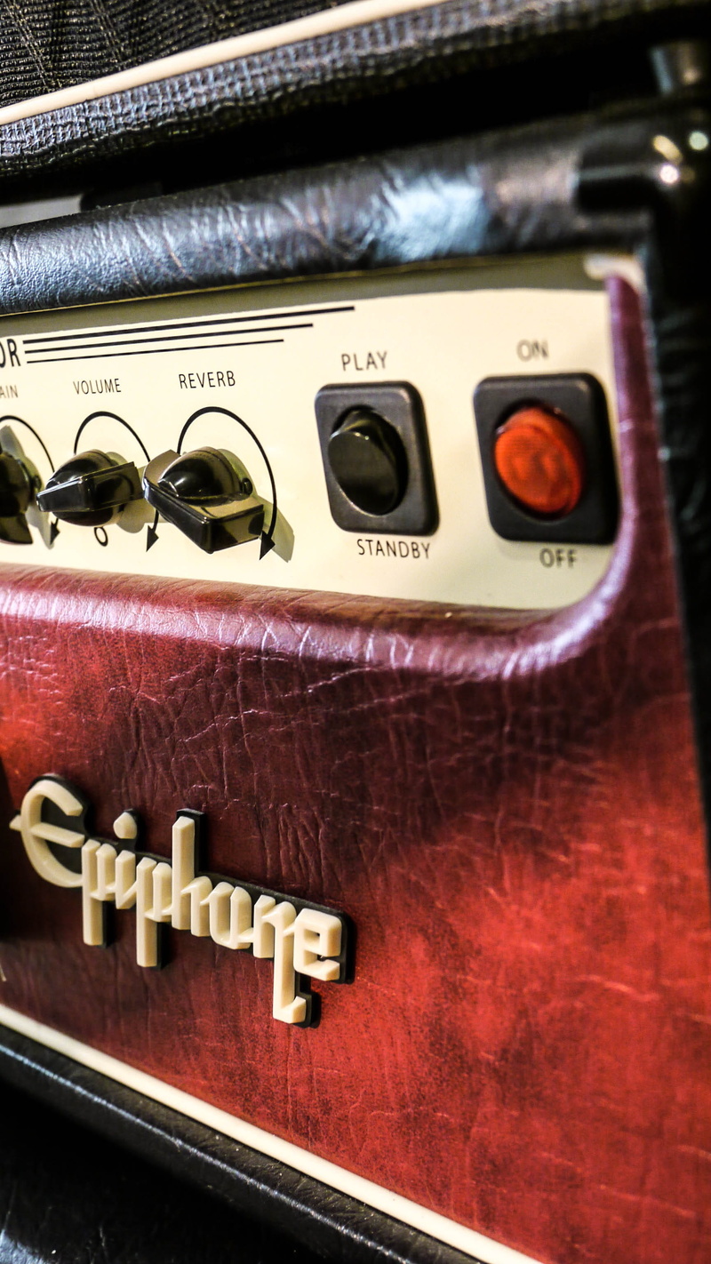 control, musical equipment, still life, connection, technology, equipment, retro styled, high angle view, western script, epiphone, no people, communication