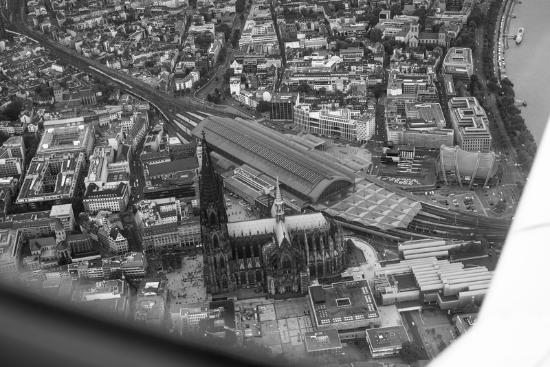 grayscale, landscape, cologne, germany, no people, town, architecture, mode of transportation, aerial view, connection, view, day, scenery, photo, focus on background