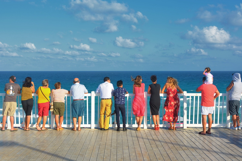 full length, water, footwear, waterfront, deck, rear view, lifestyles, teenager, day, wood, pier, women, shoe, beach, horizon over water, bridge, port