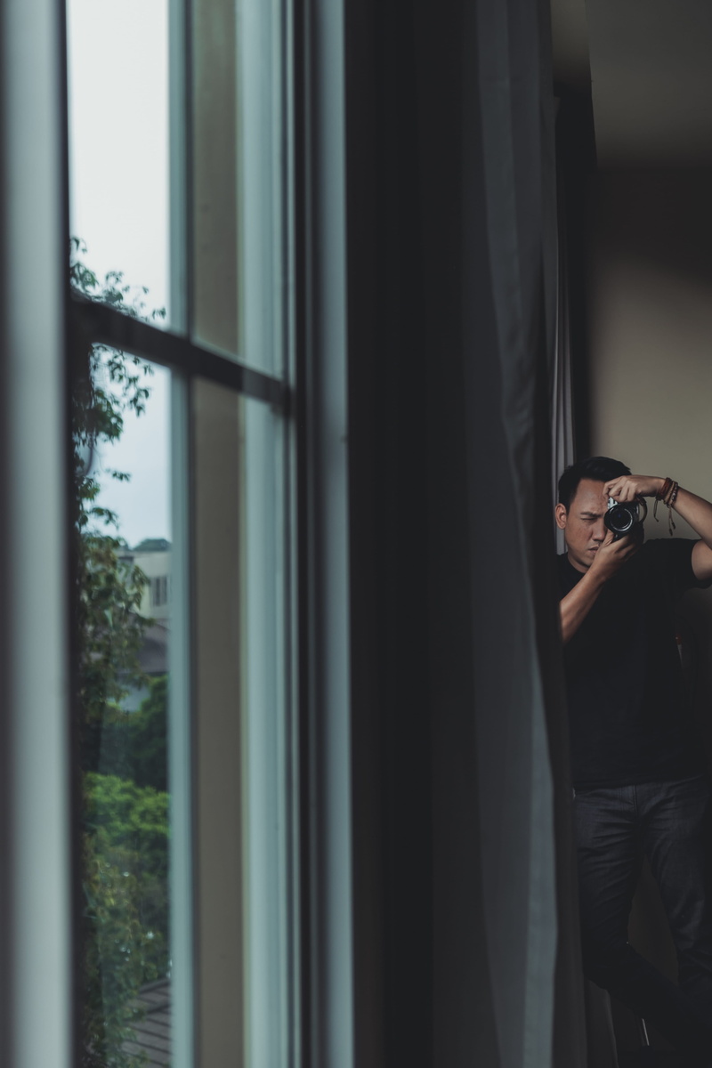 picture window, sport, black, near, looking, indoors, human, day, window, casual clothing, t, photography themes, camera - photographic equipment, real people