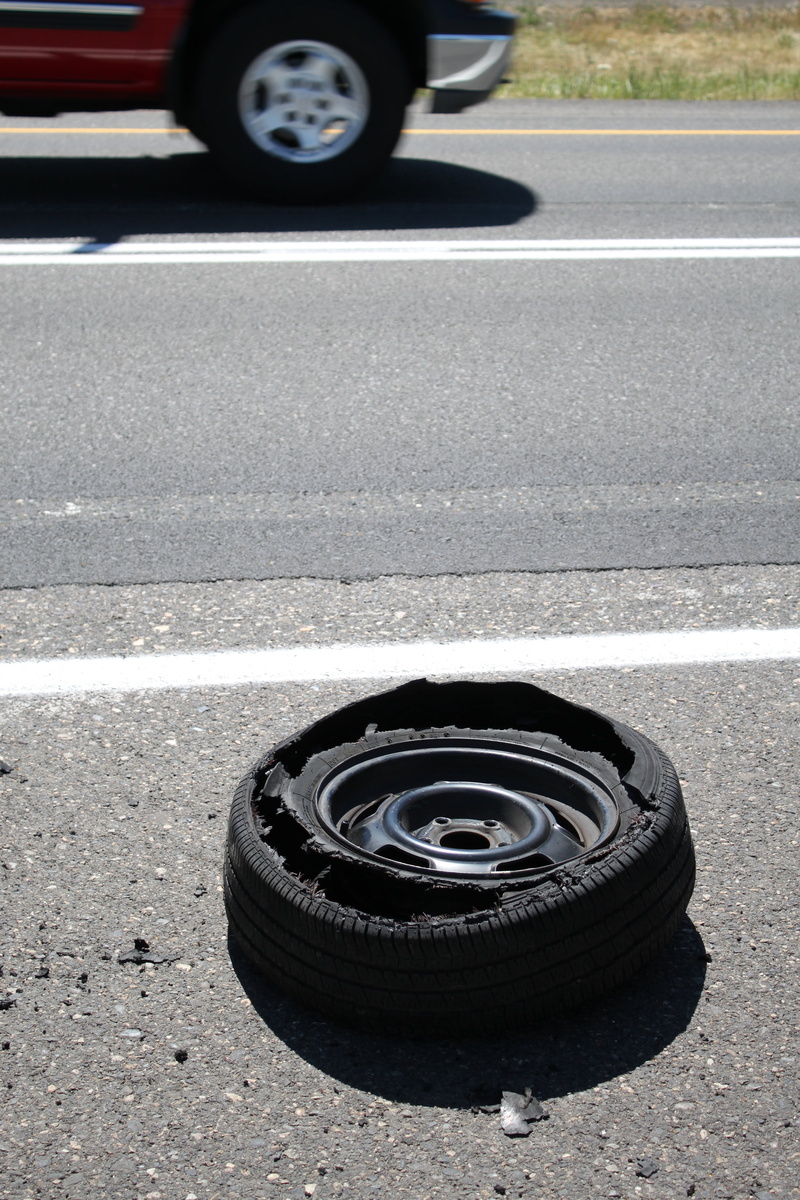 transportation, worn, outdoors, marking, rubber, near, burst, vehicle, land vehicle, puncture, tyre, blowout, road, wheel, tire, high angle view, sign