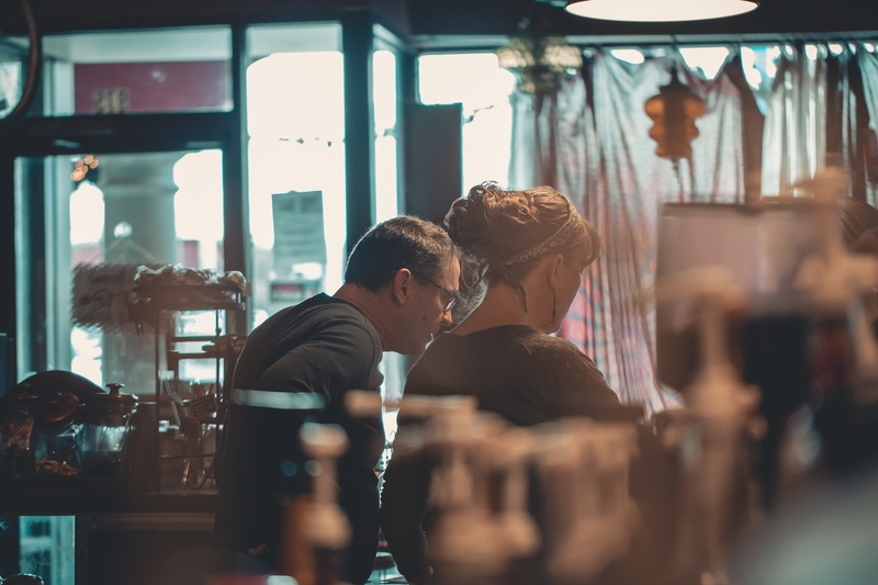 drink, shop, blond hair, young adult, indoors, working, restaurant, togetherness, business, women, commerce, young men, business owner, bar - drink establishment