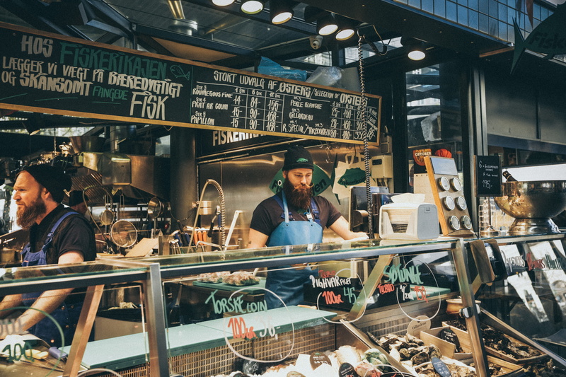 display, counter, blue, shop, deli, small business, business person, indoors, people, women, working, communication, coffee shop, man, store, apron, business
