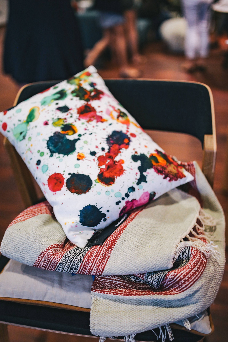 close, bed, casual clothing, grey, bag, sofa, textile, skill, craft, settee, clothing, sitting, pattern, soft, pillow, no people, ups, close-up, art and craft