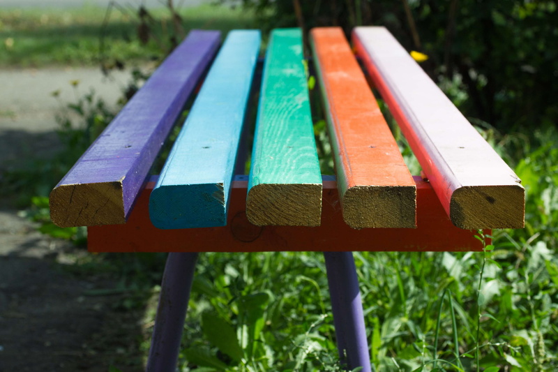 land, blue, absence, selective focus, plank, wood - material, green color, no people, water, outdoors, settee, grass, wood, nature, violet, painted, view