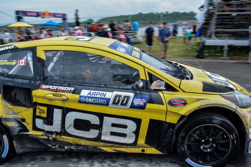 racing, rallycar, powersport, day, car, security, field, black, land vehicle, cool, 5K, jcb, incidental people, architecture, city, outdoors, movement