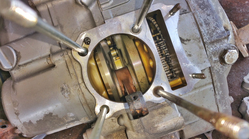 motor, silver colored, transportation, engine, crankshaft, high angle view, mode of transportation, old, dirt, sport, industry, metal, indoors, group, equipment