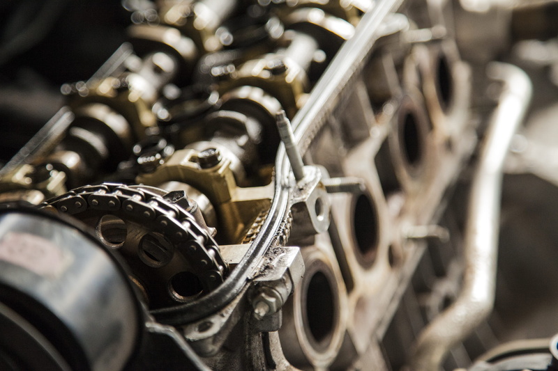 machine, engine, indoors, close-up, brass instrument, selective focus, vintage, chain, fix, focus on foreground, trumpet, musical equipment, gray, gear