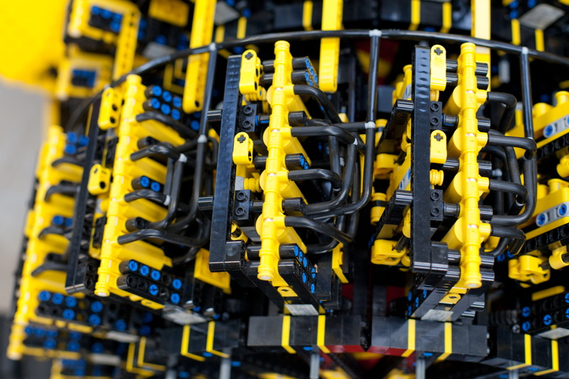 construct, toy, production line, machine, equipment, build, plastic, network connection plug, close-up, no people, global communications, factory, lego car