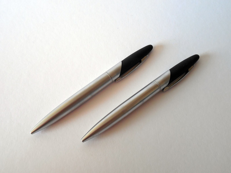 writing instrument, retractable, metal, white, black color, silver, stationery, studio shot, silver colored, surface, pen, two, coolie, indoors, still life