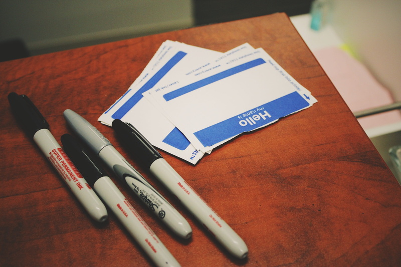 no people, label, sharpie, document, communication, four, gray, focus on foreground, education, markers, book, brown, western script, high angle view, blue