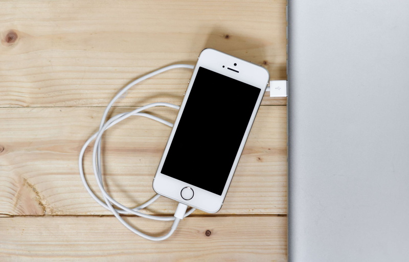 wood - material, power supply, directly above, telecommunications equipment, no people, charging, laptop, table, desk, macbook, cable, global communications